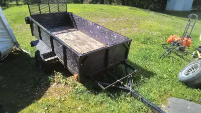"Moving Sale" Price Reduced, Utility Trailer in very good condition, It's got plywood sides and pres...