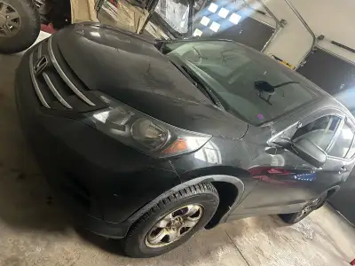 2012 Honda CRV All Wheel Drive Yes it has high kms, lots of highway driving. Everything works as it...