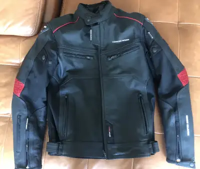 I'm selling a V Quattro Design motorcycle jacket. This stylish black jacket features genuine natural...