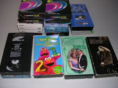 total of 5 VHS movie videos and 11 VHS tapes for recording favorite programs, in very good condition...