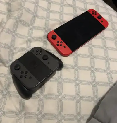Like New Nintendo Switch including 2 extra joy sticks. 4 joy sticks in total. TV Dock/Charger fully...
