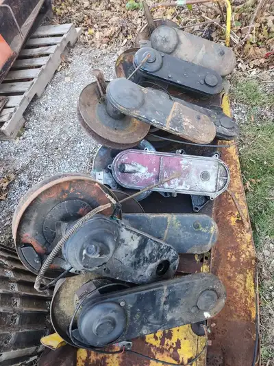 8 vintage Ski-doo snowmobile chain cases with clutches. Late 1960s to mid 1970s Ski-doo Olympique, O...