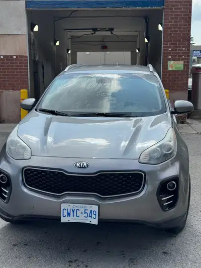 This is a used 2017 Kia Sportage LX AWD, a reliable and stylish SUV that's ready for any adventure....