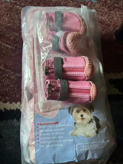 These BOUSSIKY dog boots are size 2 * 30 PCs disposable Diapers size XS they are new. These are pink...