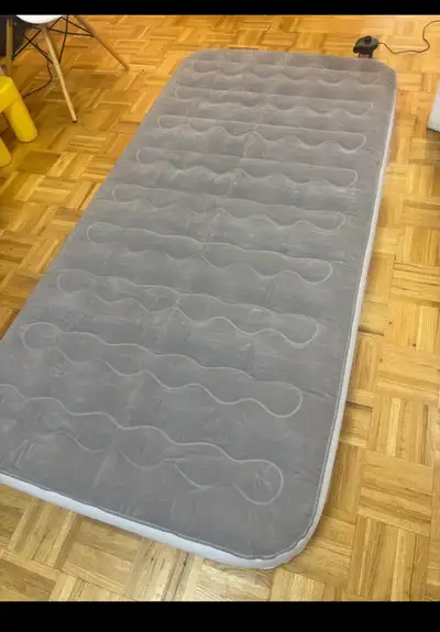 This is a brand new AGPTEK twin size air mattress, perfect for camping, home use, or travel in your...