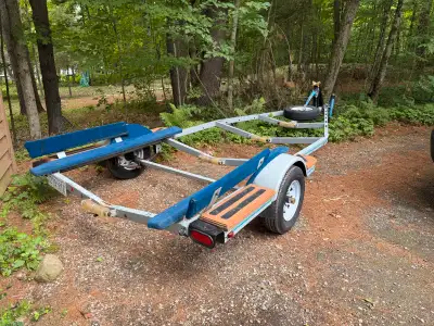 Boat Trailer 18’ long 6’ feet wide. New tires and rims. 15 feet from the bow rubber to the rear roll...