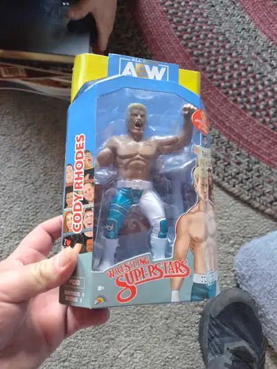 Own a piece of wrestling history with this AEW Cody Rhodes action figure! It's in new condition, sti...