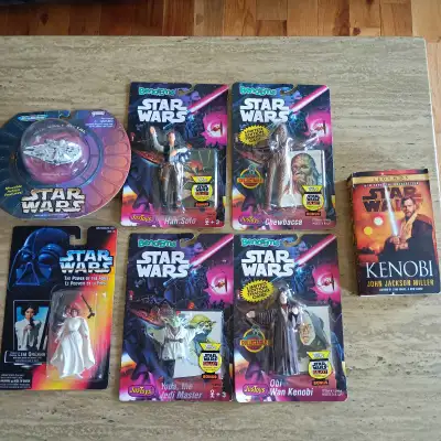 Dive into a galaxy far, far away with this Star Wars collector's bundle, featuring a mix of action f...