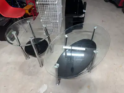 Coffee table and end table. Glass tops in good shape with minor scratches. Selling for $75 Located i...