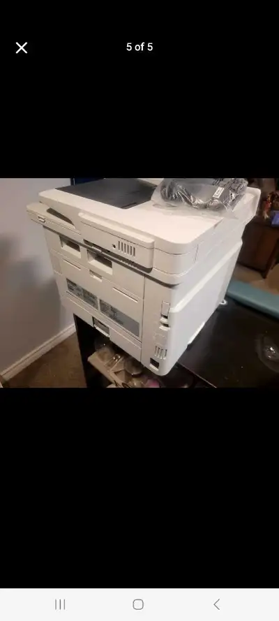 Hp laser jet printer with cords Great condition. when printing makes noise. Cash only Pick up only I...