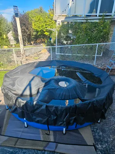 12ft diameter above ground pool. 30" deep Comes with filter, cover and ladder. Easy setup, about 45...