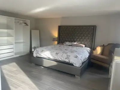 Spacious master bedroom located on upper floor of a Detached home in Central Erin Mills. with King B...