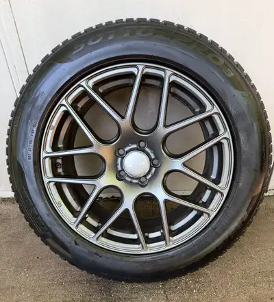 Tires: PIRELLI WINTER SOTTOZERO 3 BSW 225/60 R18 104H *70% of tread life remaining Rims: RTX Envy -...