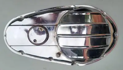 Antique Harley Davidson motorcycle primary chrome cover, View more
