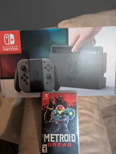 Nintendo switch with Metroid Dread game, View more
