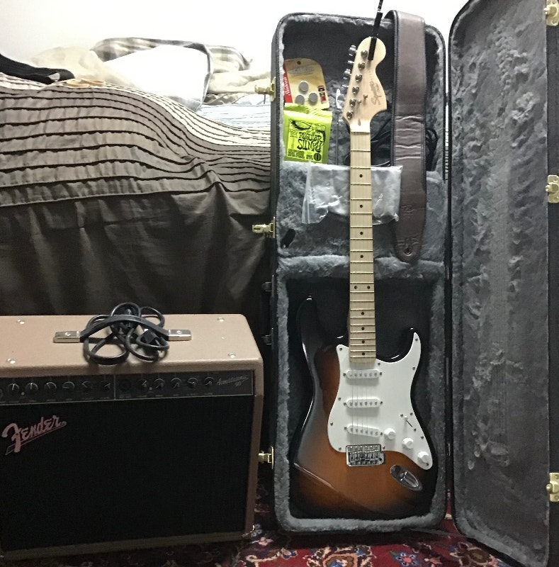 Squire strat quitar with amp for sale Guitars Barrie Kijiji