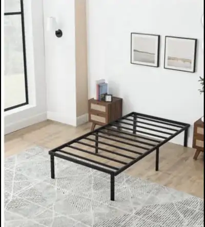 Selling Metal Bed Frame and IKEA TWIN MATTRESS 1 Mattress Cover and 1 TWIN bed sheets comes with it...